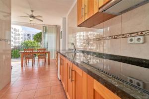 Η κουζίνα ή μικρή κουζίνα στο Carabeo 23- Acceso a la Playa