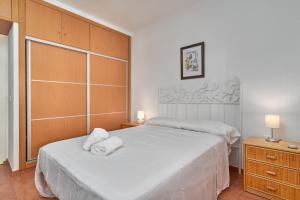 Ένα ή περισσότερα κρεβάτια σε δωμάτιο στο Carabeo 23- Acceso a la Playa +20 φωτογραφίες