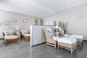Ein Sitzbereich in der Unterkunft Apartmentanlage Meerblickvilla Apartmentanlage Meerblickvilla 2-18