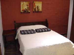 Katil atau katil-katil dalam bilik di Hotel Villa Santo Domingo