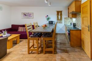 Kuchyň nebo kuchyňský kout v ubytování Apartmány Skihouse Jasná
