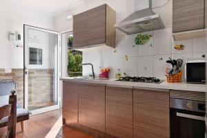 Η κουζίνα ή μικρή κουζίνα στο Vivienda V Torres 4 +18 φωτογραφίες