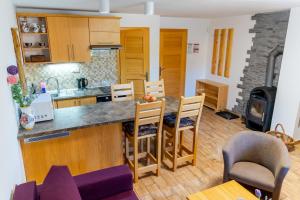 Kuchyň nebo kuchyňský kout v ubytování Apartmány Skihouse Jasná