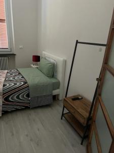 Un pat sau paturi într-o cameră la Casa Zingardi