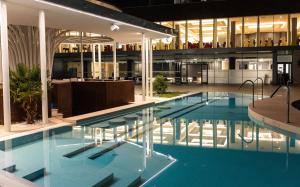 a large swimming pool in the middle of a building at Grand Hotel Park in Dubrovnik