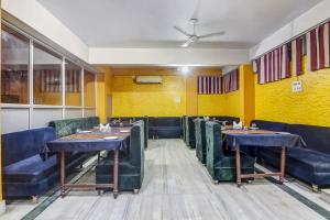 ห้องอาหารหรือที่รับประทานอาหารของ Collection O Hotel Aaradhya Heritage