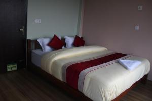 Postel nebo postele na pokoji v ubytování Hotel Garangja