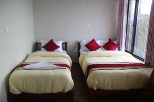 Postel nebo postele na pokoji v ubytování Hotel Garangja