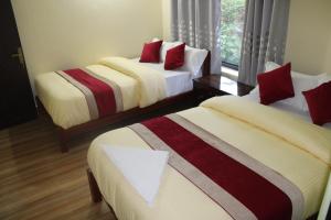 Postel nebo postele na pokoji v ubytování Hotel Garangja