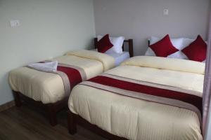 Postel nebo postele na pokoji v ubytování Hotel Garangja