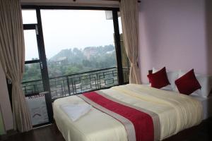 Postel nebo postele na pokoji v ubytování Hotel Garangja