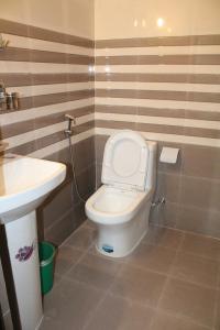 Koupelna v ubytování Hotel Garangja + 37 fotografií