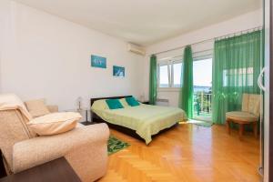 Posteľ alebo postele v izbe v ubytovaní Apartment Two Sisters