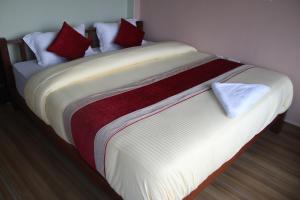 Postel nebo postele na pokoji v ubytování Hotel Garangja