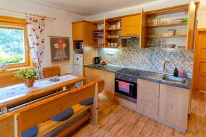 Kuchyň nebo kuchyňský kout v ubytování Apartmány Skihouse Jasná