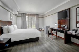 Postelja oz. postelje v sobi nastanitve Protea Hotel by Marriott Klerksdorp