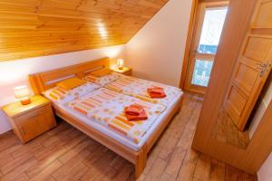 Postel nebo postele na pokoji v ubytování Apartmány Skihouse Jasná