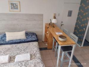 Postel nebo postele na pokoji v ubytování Monoambiente PANTER