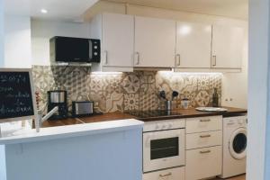 Η κουζίνα ή μικρή κουζίνα στο Havre de Paix au Centre de Rouen +2 φωτογραφίες