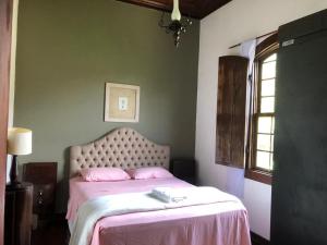 Katil atau katil-katil dalam bilik di Casa Temporada com Tranquilidade e Aconchego - Petrópolis - RJ +20 gambar