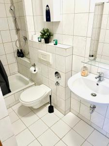 A bathroom at Stadtoase Design Wohnung in der Altstadt