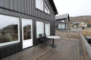 En balkong eller terrasse på RIBO Apartment Katterjåkk
