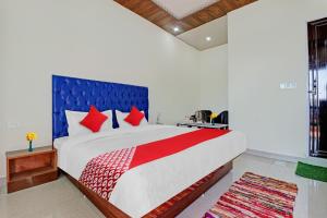 Cama o camas de una habitación en Flagship Shri Shyam Home Stay