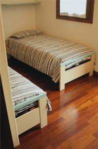 Tempat tidur dalam kamar di Casa Toè da Regina