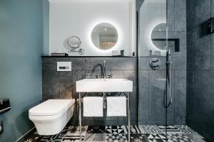 Koupelna v ubytování Hotel am Ochsentor + 22 fotografií