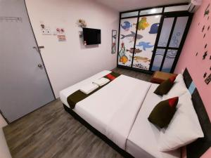 Postel nebo postele na pokoji v ubytování Good2Stay Hostel + 6 fotografií