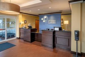 a law firm office with a reception desk and a phone at Holiday Inn Express & Suites Lebanon, an IHG Hotel in Lebanon