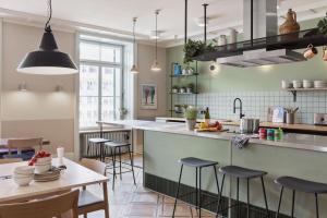 A kitchen or kitchenette at Stay KooooK Leipzig City - Online Check In NEW OPENING