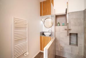 Kúpeľňa v ubytovaní Appartement cosy NANCY