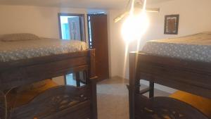 Postel nebo postele na pokoji v ubytování Hotel Casa la Gregorienne
