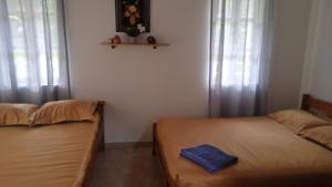 Postel nebo postele na pokoji v ubytování Hotel Casa la Gregorienne