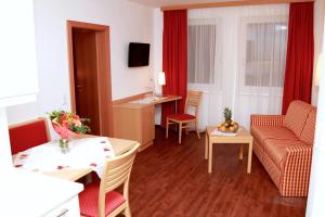 TV in/ali zabaviščno središče v nastanitvi City-Hotel Mödling