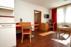 TV in/ali zabaviščno središče v nastanitvi City-Hotel Mödling