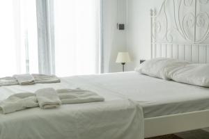Posteľ alebo postele v izbe v ubytovaní Seaside Serenity in Bodrum: Luxury Retreat w View
