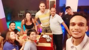 a group of people posing for a picture in a room at Hôtel Bia Besta in Boumalne Dades