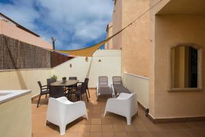 Posedenie v ubytovaní Sunset Beach 4 Bedroom Villa 200m to Beach+Fast WIFI