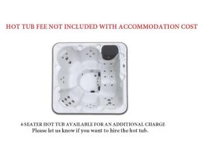een foto van een hot tub verwarming die niet bij de associatiekosten is inbegrepen bij Westertonhill Holiday Lodges in Balloch