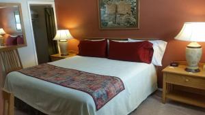 Voodi või voodid majutusasutuse Stone Lizard Lodge toas