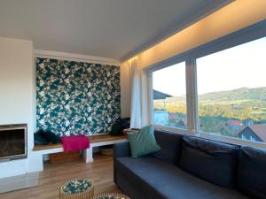 Posezení v ubytování Ferienwohnung Traumblick