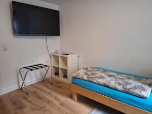 Postel nebo postele na pokoji v ubytování Schöni´s Zimmer