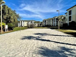 a sand road in front of some houses at Theme Park Paradise! in Kissimmee