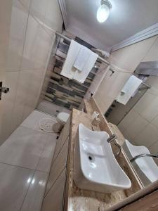 Et badeværelse på Belo Apto. 3/4 no setor Marista