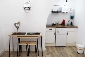 Η κουζίνα ή μικρή κουζίνα στο Amores Loft Rural