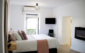 Ένα ή περισσότερα κρεβάτια σε δωμάτιο στο Amores Loft Rural