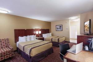 Letto o letti in una camera di Hotel Moab Downtown