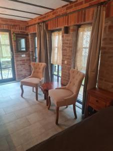 Posezení v ubytování Hotel b&b altes hinterhäusel